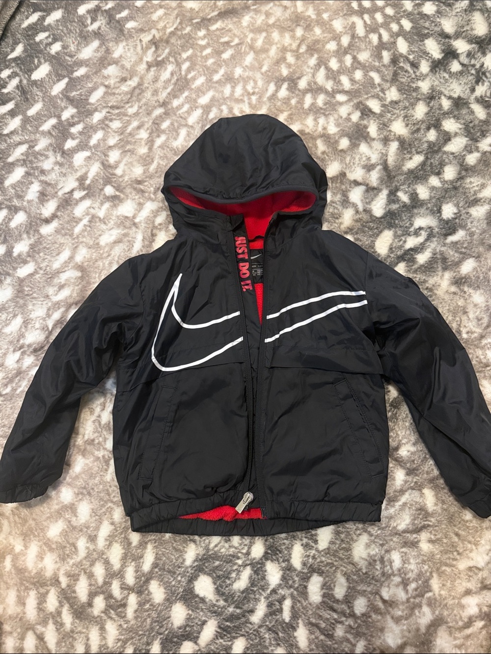 Nike Kids Black Hooded Jacket with Red Lining and White Swoosh